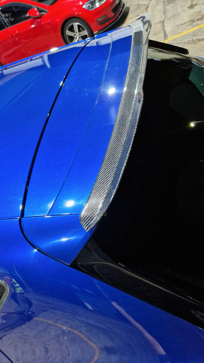 Custom My Ride carbon fibre lip spoiler installed on the rear roof of a blue Seat Leon 5F hatchback